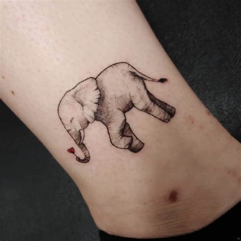 Cartoon Elephant Outline Tattoo