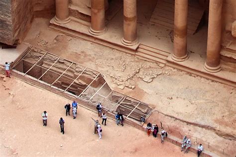 Older tombs below Al-Khazneh, Petra. Art Destination Jordan