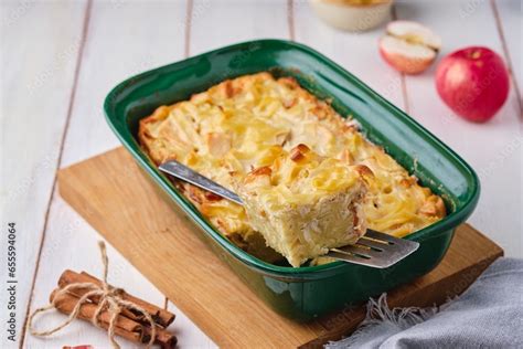 Kugel, a casserole of noodles, cottage cheese, apples and raisins in a ...