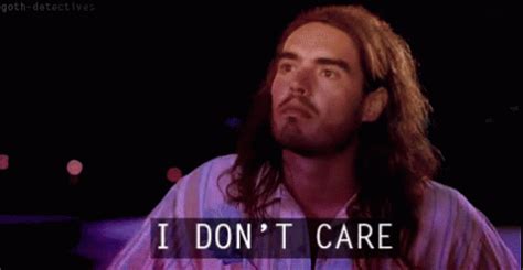 I Don't Care GIF - RussellBrand IDontCare IDC - Discover & Share GIFs