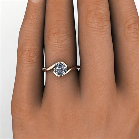 Unique solitaire engagement ring with half bezel or bypass bezel and ...