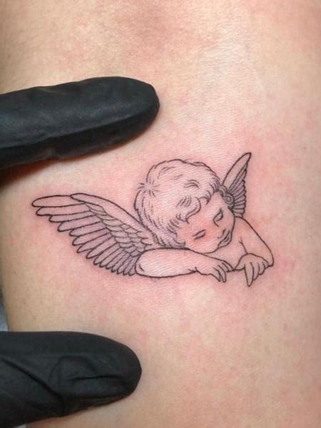 Sleeping Angel Tattoo Designs