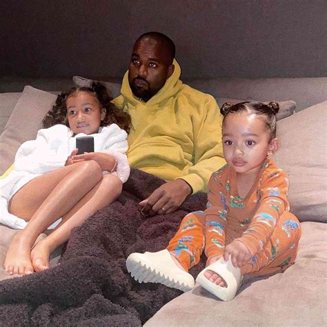 Kanye West Cuddles with Daughters Chicago and North for TV Time