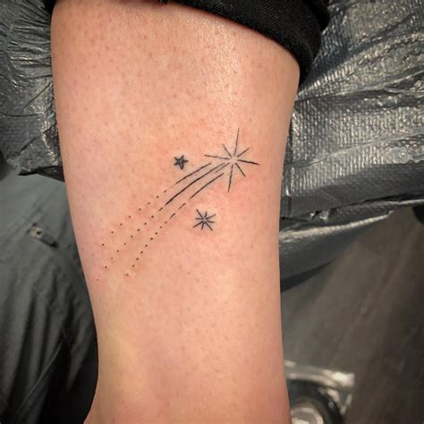 Shooting Star Tattoo Ideas for a Touch of Cosmic Magic