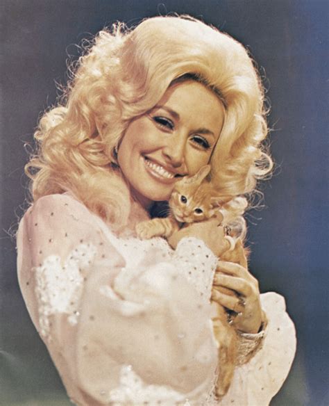 Dolly Parton holding a Kitten, 1970s. : r/aww