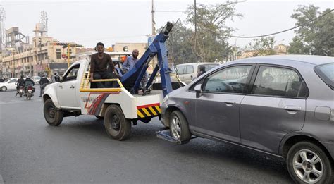 Car towed away by cops in Gurugram? Call the new traffic helpline on ...