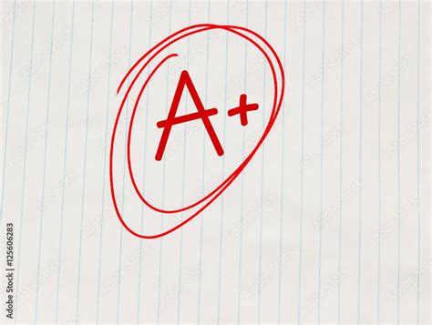 A plus (A+) grade written in red on notebook paper Stock Photo | Adobe ...