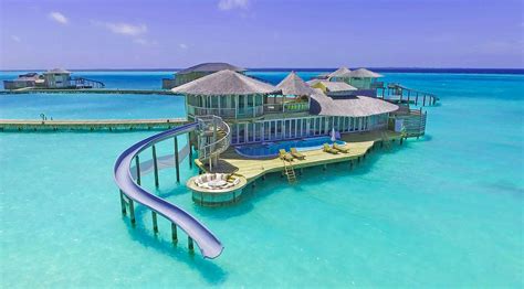 These villas in the Maldives have slides that take you right into the water