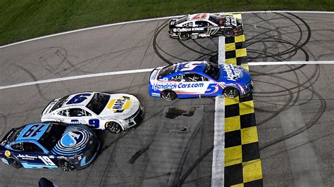 NASCAR: Kyle Larson edges Chris Buescher at Kansas in closest finish