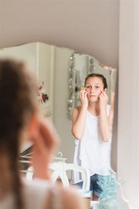 "Teen Girl Looking At Her Reflection In The Mirror" by Stocksy ...