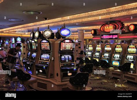 LAS VEGAS, USA - APRIL 14, 2014: People visit slot machines at Caesar's ...