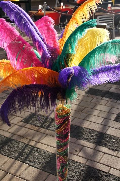 Oversized Carnival Feathers & Beads in tall vase for a Carnival Themed ...