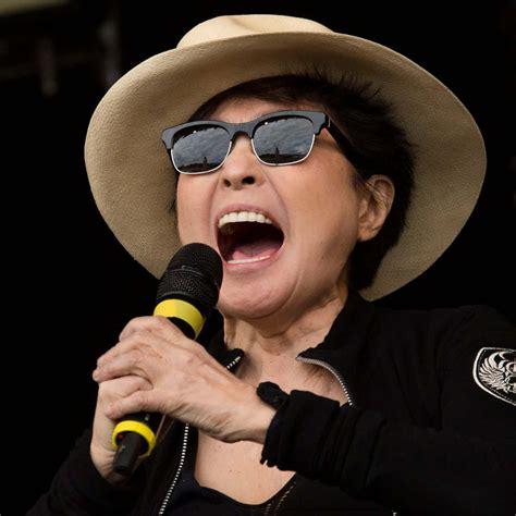 Download Yoko Ono Screaming Microphone Wallpaper | Wallpapers.com