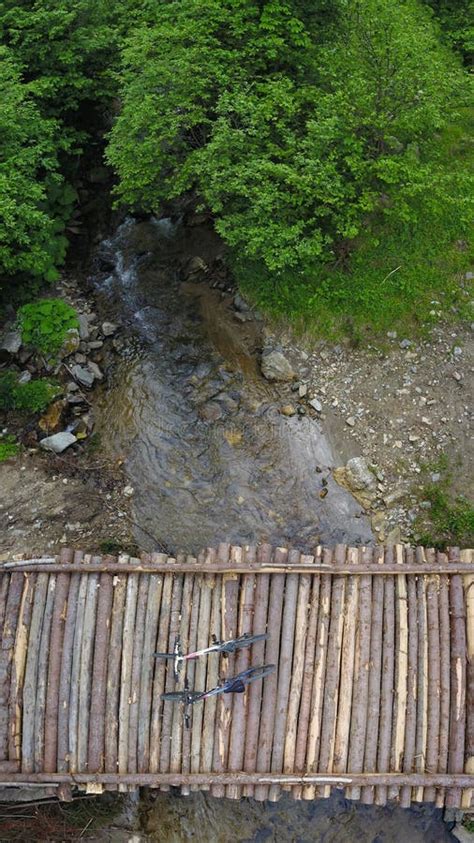 Bicycles on a bridge stock photo. Image of watercourse - 268531802