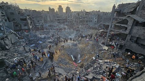 Israel-Gaza latest: Deadly strike on refugee camp 'targeted top Hamas ...