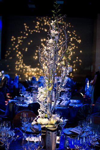 Mayor's Cultural Gala Centerpiece | Gala centerpieces, Wedding table ...