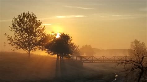 Sunrise cutting through the early morning fog over North Natomas ...