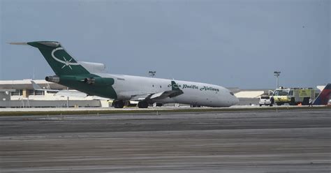 Boeing 727 cargo plane lands without functioning landing gear