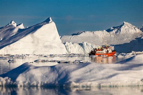 Greenland treads softly on tourism as icebergs melt