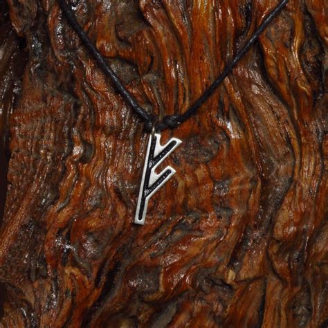 Fehu rune pendant by PeSymbolic on DeviantArt