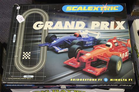 A Scalextric grand prix racing car set with Bridgestone and Minolta ...