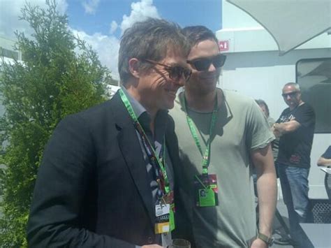 Nicholas Hoult bumps into Hugh Grant at Formula One | HELLO!