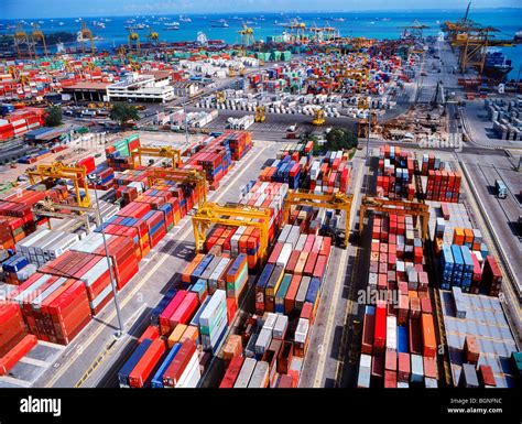 Overview of cargo container docks in Singapore packed with boxes and ...