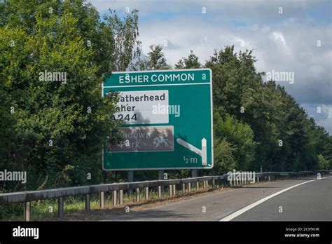 Partially obsured route signs on the A3 dual carriageway in Surrey ...