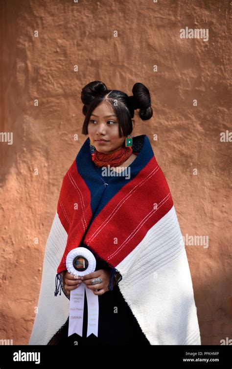 A young Native-American (Hopi) woman wearing traditional Hopi clothing ...