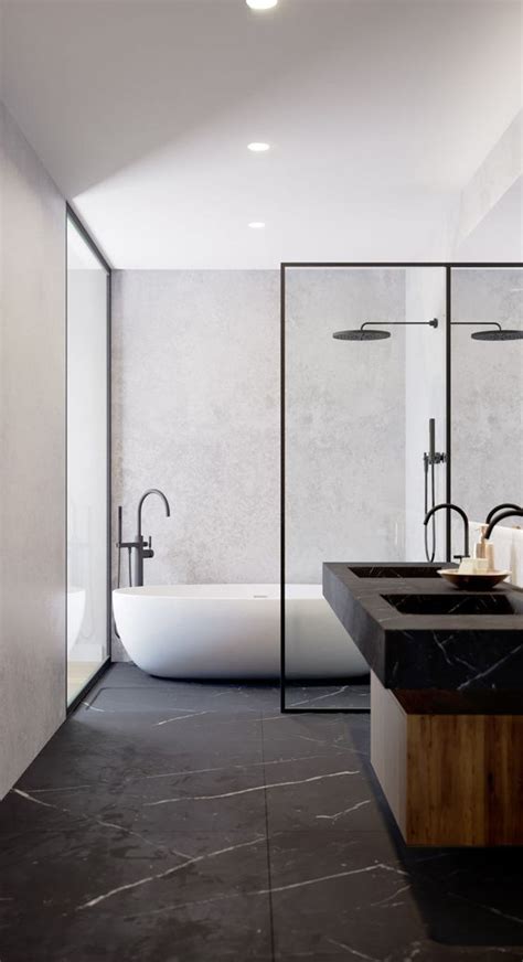 a luxurious minimalist bathroom with a black marble floor and sinks, a ...