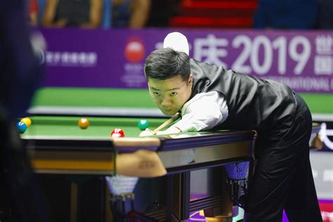 China’s Ding Junhui storms into last 16 of snooker championship - CGTN