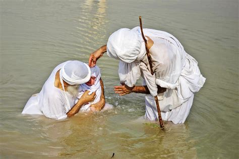 Mandaeans practicing baptism in Karun River - Tehran Times