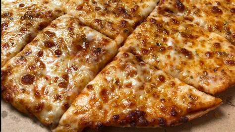 Domino's Thin Crust Pizza: What To Know Before Ordering