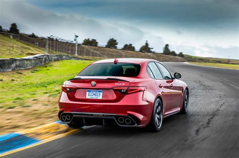 2017-Alfa-Romeo-Giulia-Quadrifoglio-rear-three-quarter-in-motion-03 ...