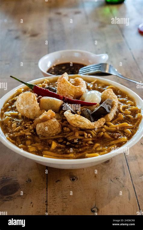 Sumptous Batangas Lomi in a bowl served hot full of toppings Stock ...