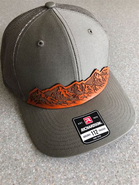 Mountain range leather patch hat. Richardson SnapBack trucker | Leather ...