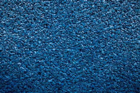 Premium Photo | Background from granules of blue color closeup