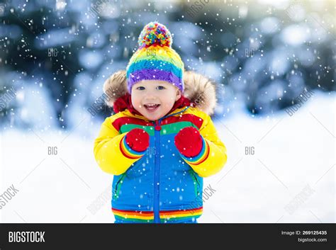 Child Playing Snow Image & Photo (Free Trial) | Bigstock