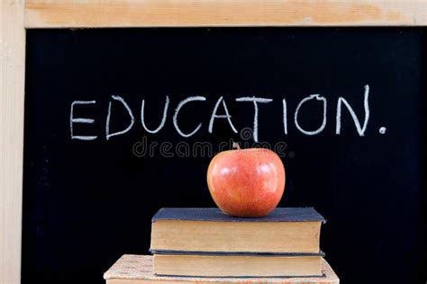 EDUCATION on Chalkboard with Apple & Books Stock Photo - Image of study ...