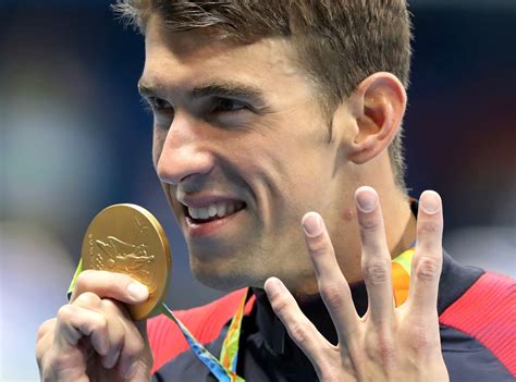 Does Michael Phelps' Baby Boy Weigh More Than His 28 Olympic Medals?