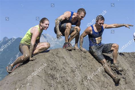 Contestants participate Mud Day fun obstacle course Editorial Stock ...