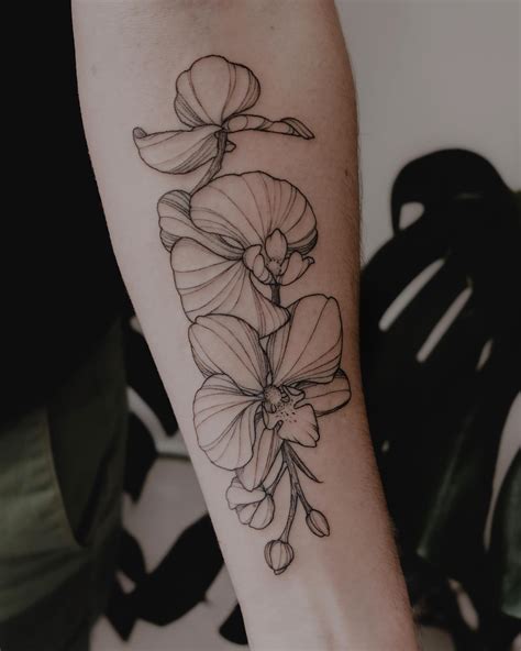 Small Black And White Orchid Tattoos