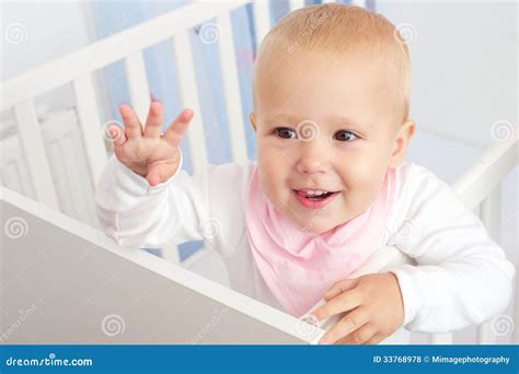 Portrait of a Cheerful Baby Waving Hello Stock Photo - Image of child ...