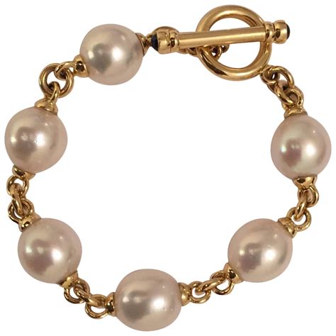 18kt Yellow Gold link and South Sea Pearl Bracelet finished with Toggle ...