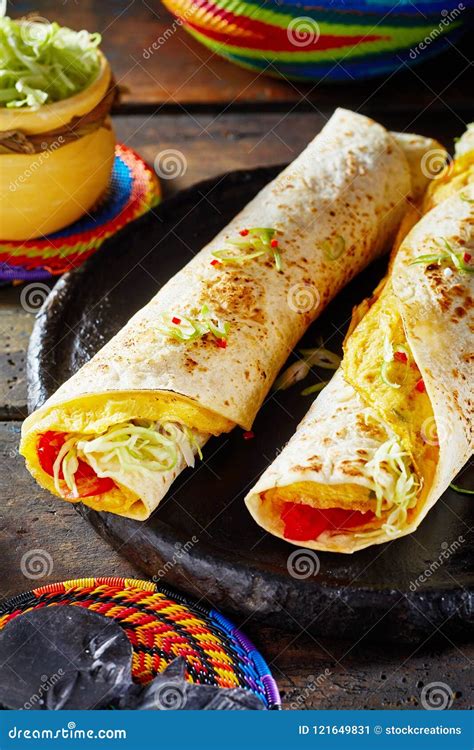 Tasty Ugandan Street Food with Two Rolex Rolls Stock Image - Image of ...