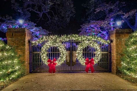 Entrance Gate Decorated in Christmas Lights and Greenery