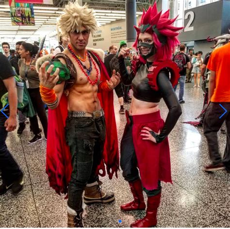 two people dressed up in costumes standing next to each other