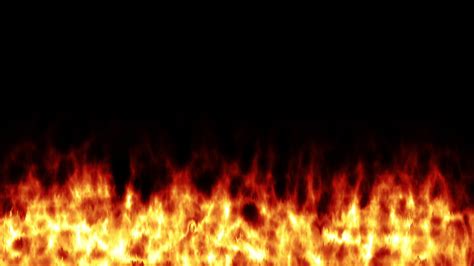 A line of real flames ignite on a black background. 20614861 Stock ...