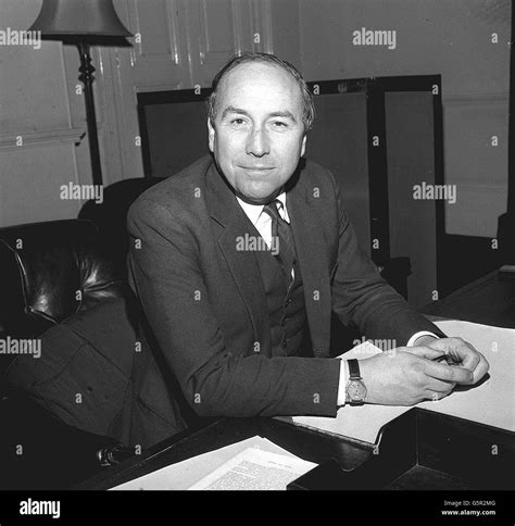 Mr Roy Jenkins, the new Home Secretary, at his desk in the Home Office ...