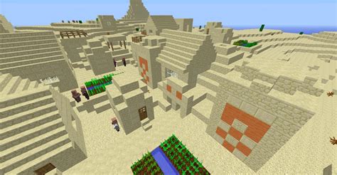 This sand temple had spawned right in the middle of a village : Minecraft